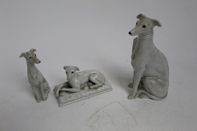 Lot 916 - Group of three continental white Greyhounds