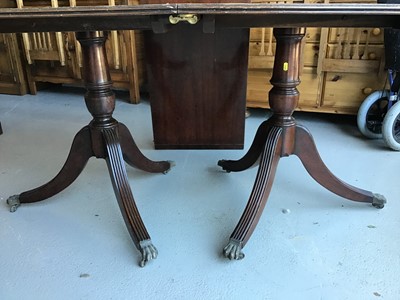 Lot 45 - Two reproduction mahogany D-end dining table both with an extra leaf
