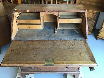 Lot 48 - 19th century oak bureau with fitted interior above three drawers on bracket feet H106.5cm W90cm D48.5cm