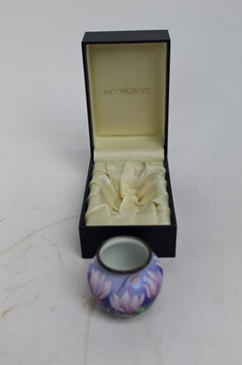 Lot 922 - Moorcroft enamel miniature vase decorated with flowers, 5cm high, in original box