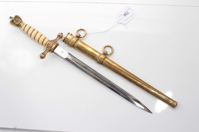 Lot 726 - Second World War Nazi Kreigsmarine Dress Dagger with etched polished steel blade by Clemen & Jung, Solingen wire bound cream celluloid grip, in brass scabbard