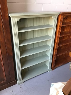 Lot 52 - Contemporary painted open bookcase with panelled back, four fixed shelves on bracket feet H144.5cm W97cm D27cm