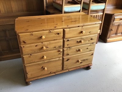Lot 55 - Ducal pine chest of eight drawers on turned feet