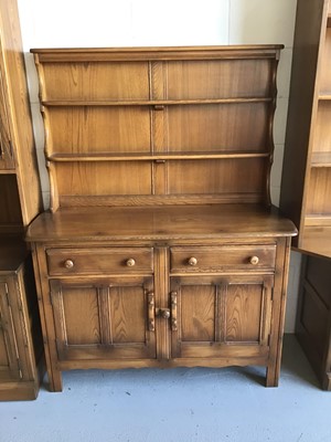 Lot 62 - Ercol elm dresser with shelved back two drawers and two cupboard doors below H160cm W122cm D47cm