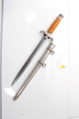 Lot 730 - Nazi Wehrmacht 1935 pattern officers' dress dagger with orange celluloid grip, plain blade, bearing no makers marks in scabbard