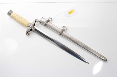 Lot 731 - Nazi Wehrmacht 1935 pattern officers' dress dagger with orange celluloid grip, plain blade by WKC Solingen, in scabbard