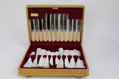 Lot 1976 - 1950s oak cased canteen of cutlery (unused)