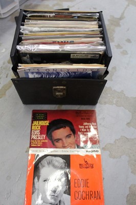 Lot 1852 - Four Vintage cases of 7" singles and EPs including Elvis Presley and Eddie Cochran