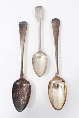 Lot 129 - Two Georgian silver old English pattern table spoons together with a silver fiddle pattern spoon