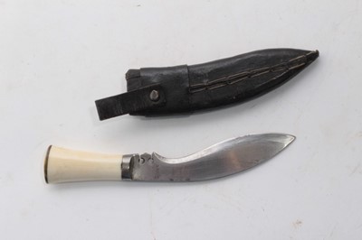 Lot 752 - Second World War Japanese Arisaka type 30 bayonet, with an unusual quillion (lacking scabbard), together with two hunting knives, a Malayan Kris and a miniature Kukri. (5)