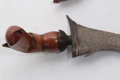 Lot 752 - Second World War Japanese Arisaka type 30 bayonet, with an unusual quillion (lacking scabbard), together with two hunting knives, a Malayan Kris and a miniature Kukri. (5)
