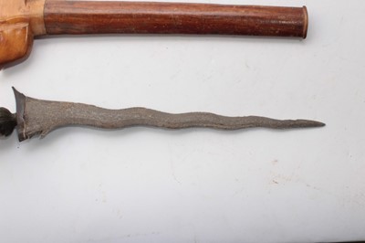 Lot 752 - Second World War Japanese Arisaka type 30 bayonet, with an unusual quillion (lacking scabbard), together with two hunting knives, a Malayan Kris and a miniature Kukri. (5)