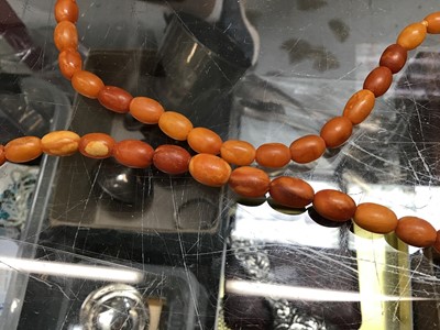 Lot 76 - Two amber bead necklaces, other vintage bead necklaces and costume jewellery