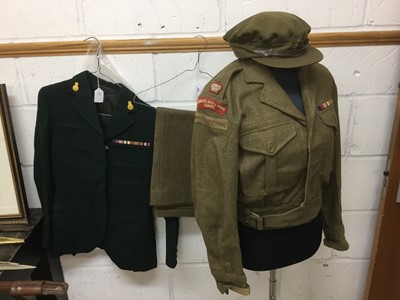 Lot 598 - 1950s Women's Royal Army Corps dress jacket by Moss Bros, named to Capt. P. Adye, together with a 1949 pattern Battle Dress Blouse and trousers, dated 1952, also with Women's Royal Army Corp and W...