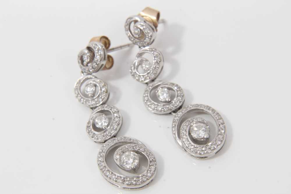 Lot 98 - Pair 14ct white gold diamond pendant earrings
