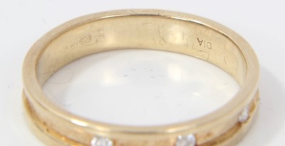 Lot 102 - 9ct gold ring set with three diamonds