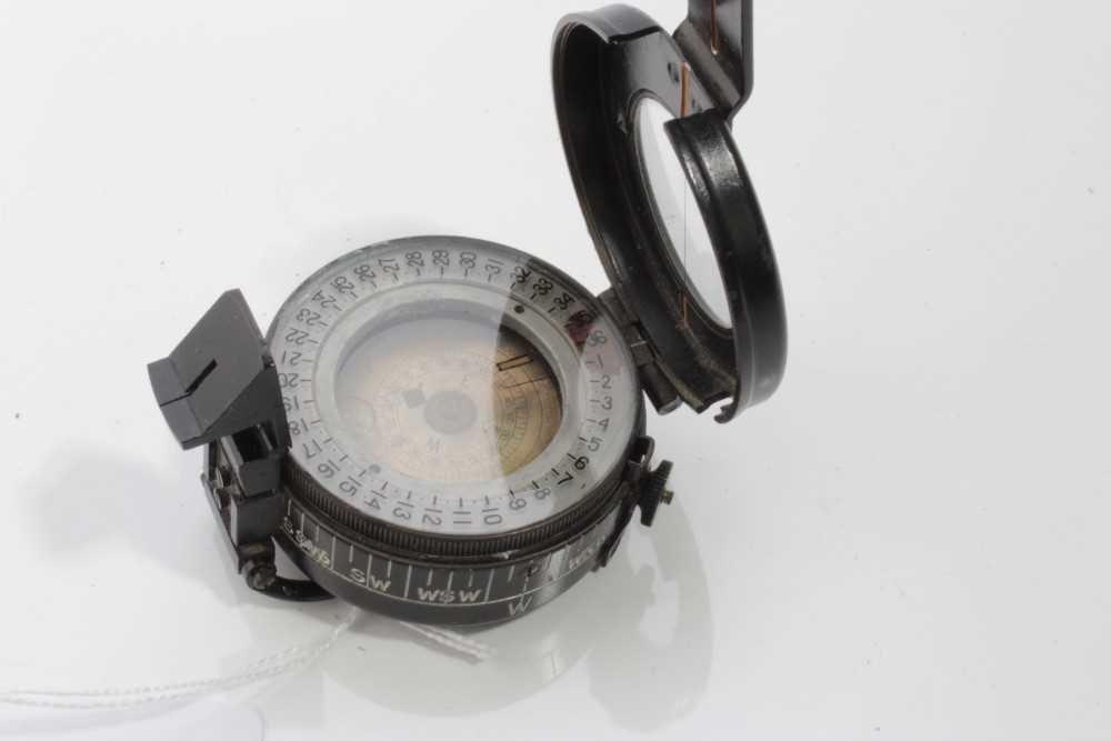 Lot 594 - Second World War British Army Officer's Prismatic Compass in black painted finish, stamped R.P.A. No. A1582 1942 MK III A
