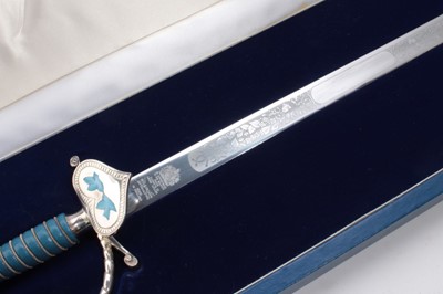 Lot 758 - Wilkinson Sword wedding cake cutting sword with etched blade in fitted box