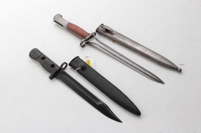 Lot 762 - 1960s British FN bayonet with scabbard and Mauser export bayonet with scabbard