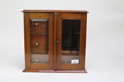 Lot 2040 - Edwardian glass fronted wooden smokers cabinet with inlaid decoration, 34cm across