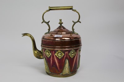 Lot 2048 - Ornate copper and brass kettle with floral decoration, circa 1900, 37cm height