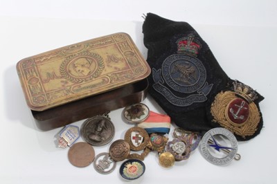 Lot 592 - First World War Princess Mary Gift Tin containing a collection of assorted military badges