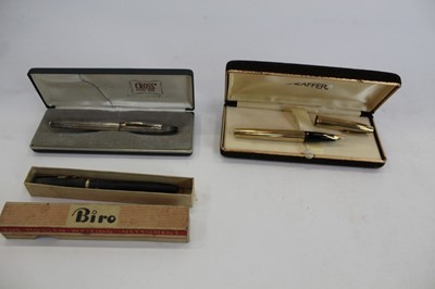 Lot 2051 - Sheaffer Gold plated fountain pen with 14k gold nib in case together with a Cross ballpoint pen in case and a Biro in case