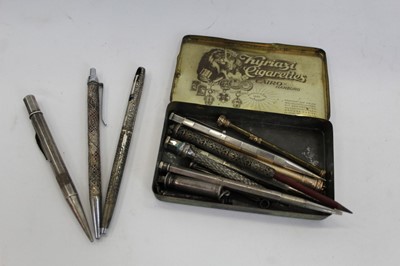 Lot 2052 - Group of thirteen silver, brass and other propelling pencils