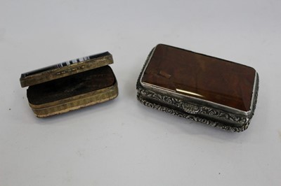 Lot 2056 - Georgian Moss Agate Snuff box with silver plated mounts together with a brass and Agate match holder (2)