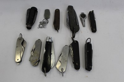 Lot 2057 - Three 1950s British Military folding knives together with a group of jack knives and other vintage knives (12 knives)