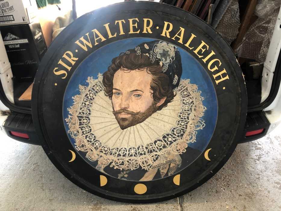 Lot 2068 - Large 20th century hand painted pub sign of circular form- 'Sir Walter Raleigh'