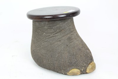 Lot 864 - Early 20th century juvenile Elephants foot, hollow with wooden stool top