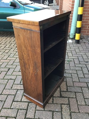 Lot 137 - Victorian rosewood open narrow bookcase with two adjustable shelves and reeded pilasters on platform base 98 cm high, 61 cm wide, 34 cm deep