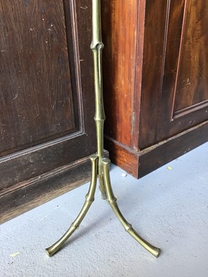 Lot 138 - Brass simulated bamboo lamp standard with shade