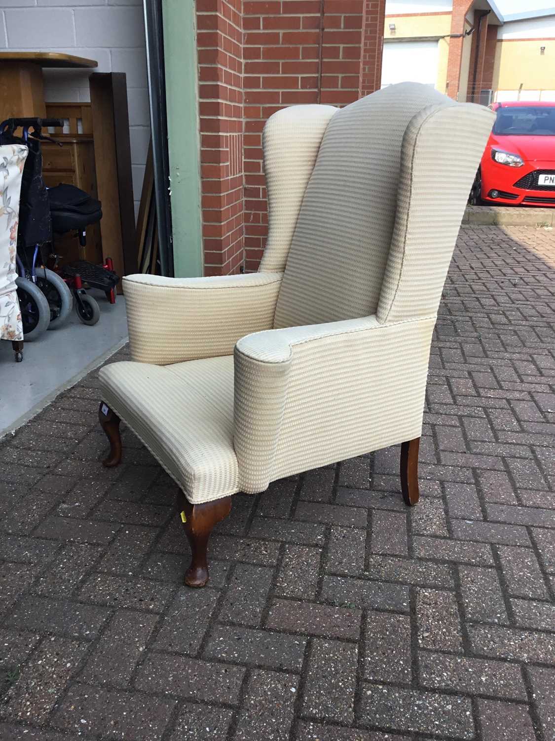 Lot 139 Old wing armchair on cabriole legs