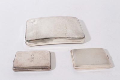 Lot 324 - George V Silver Cigarette case of curved rectangular form with engine turned decoration (Birmingham 1929) together with two silver match book holders (various dates and makers), all at 7oz