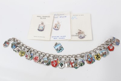 Lot 196 - Continental silver and enamel souvenir charm bracelet
