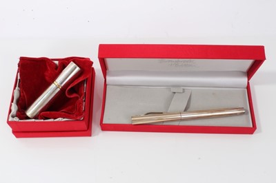 Lot 197 - Contemporary silver fountain pen and perfume bottle