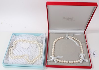 Lot 199 - Two cultured pearl necklaces, both with silver clasps