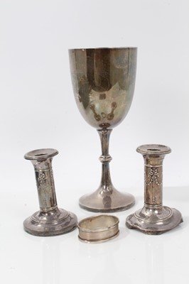 Lot 204 - Silver trophy, pair silver dwarf candlesticks and a silver napkin