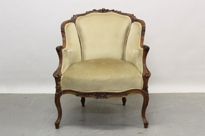 Lot 1215 - Victorian carved walnut beige velvet upholstered tub chair.