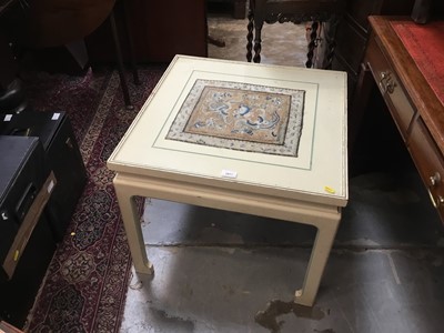 Lot 135 - Chinese-style Cream painted, glass topped side table with Chinese embroidered panel