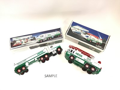 Lot 1548 - Collection of approximately 11 boxed Hess trucks