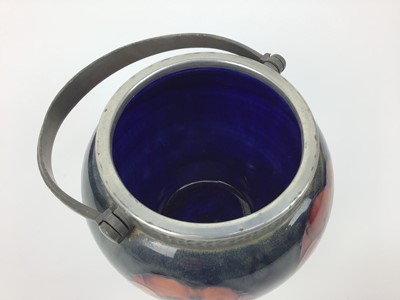 Lot 18 - Moorcroft pewter mounted biscuit barrel decorated in the poppy pattern on blue and green ground