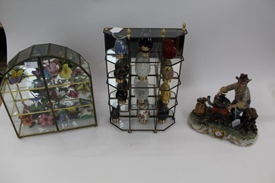 Lot 1000 - Collection of egg ornaments on stands with display case, plus a collection of butterflies in glazed cabinet and a Capo-di-monte figures