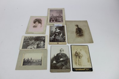 Lot 1136 - Postcards - Military including WW1, real photographic cards, camp life, sports teams, bands, portraits, hospital groups, parades, silks, airship  etc. Loose in shoe box.