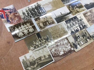 Lot 1136 - Postcards - Military including WW1, real photographic cards, camp life, sports teams, bands, portraits, hospital groups, parades, silks, airship  etc. Loose in shoe box.