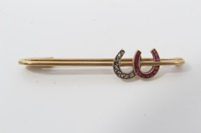 Lot 232 - 18ct gold bar brooch with diamond and ruby set horseshoes