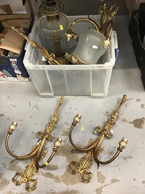Lot 130 - Four brass wall sconces together with an oil lamp and a hand mirror