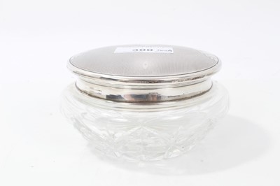 Lot 300 - 1940s Cut glass vanity jar with engine turned silver top in the Art Deco style (Birmingham 1949)